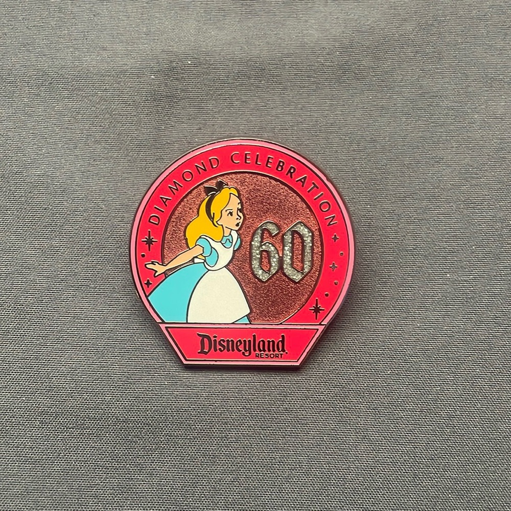DLR 60th Diamond Celebration Mystery Alice Pin